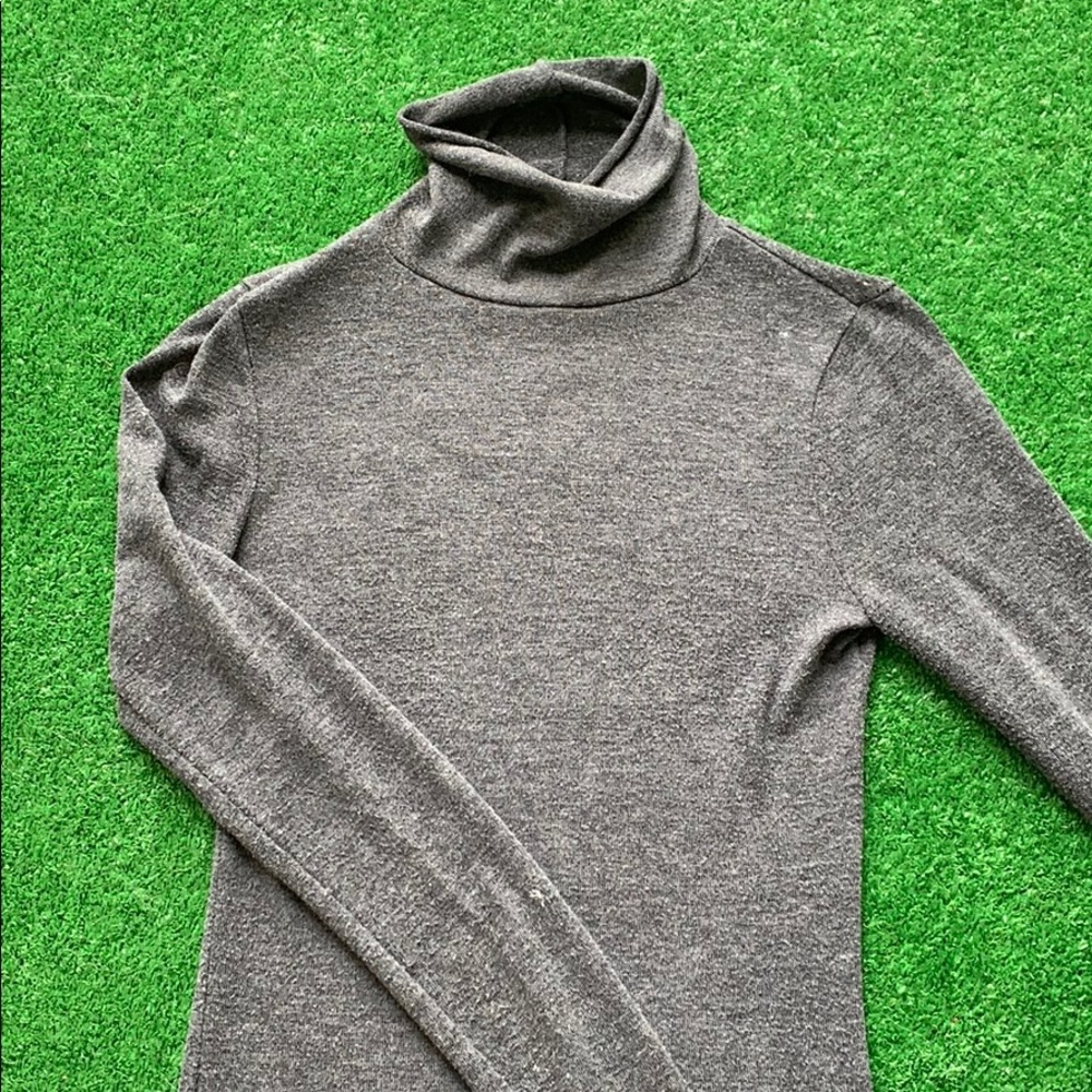 A soft grey turtleneck.